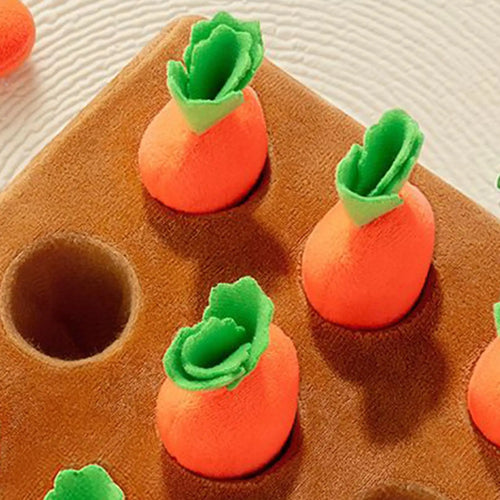 Close-up of the plush carrots and hidden pockets in the snuffle mat