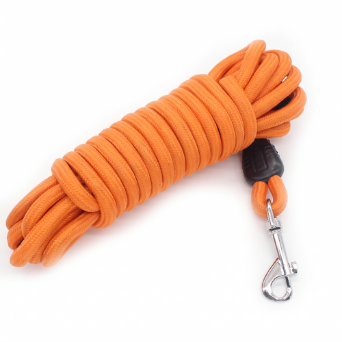 Orange long dog training leash coiled with swivel clip on a white background